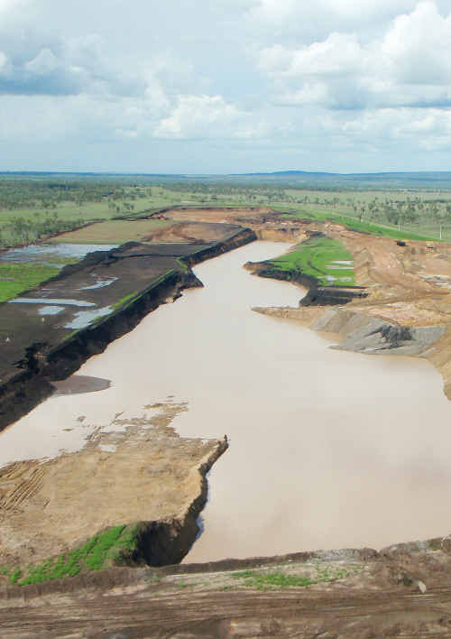 DISCHARGE UNDERWAY: Water stored at Rollestone Mine following the February floods is being released into Comet River after Xstrata received approval from DERM. file DISCHARGE UNDERWAY: Water stored at Rollestone Mine following the February floods is being released into Comet River after Xstrata received approval from DERM. file